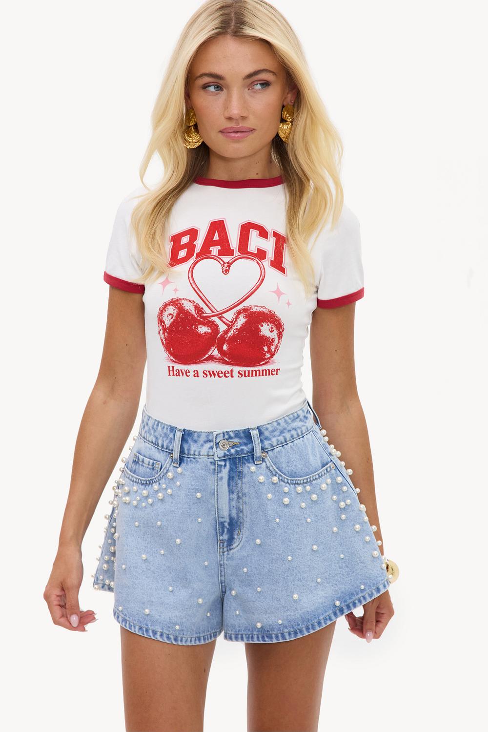 Light blue shorts with pearl details