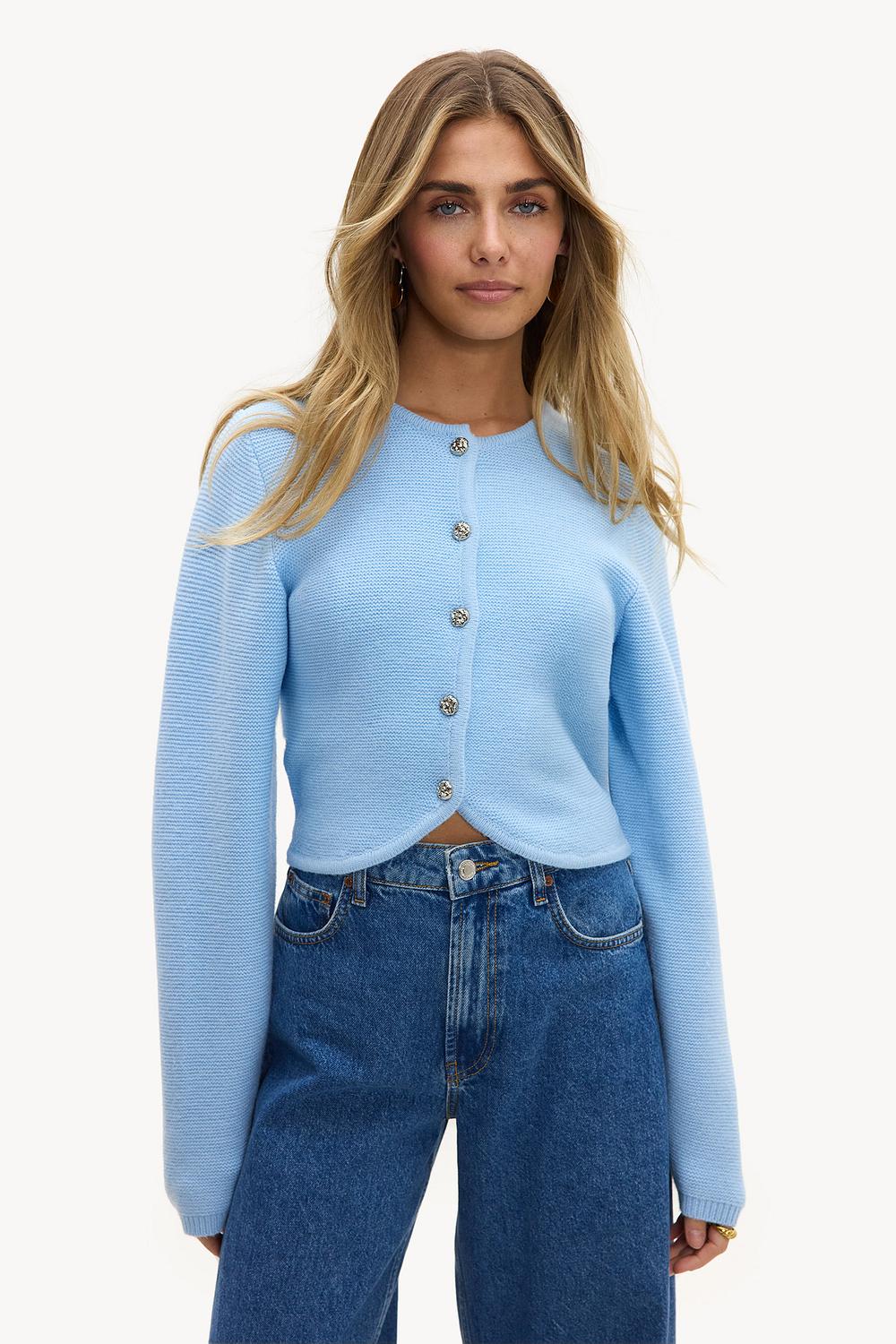 Light blue cardigan with silver buttons