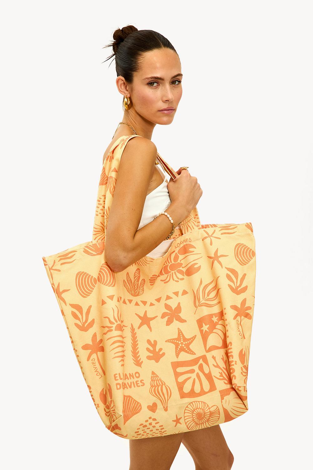 Light yellow bag with print