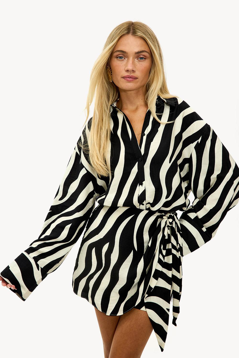 Zwarte blouse met zebraprint