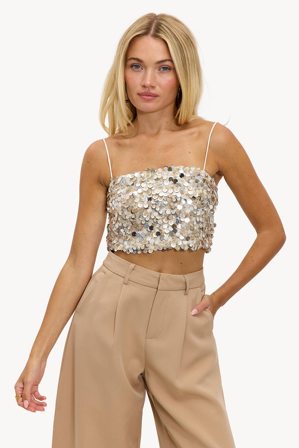 Top beige con purpurina