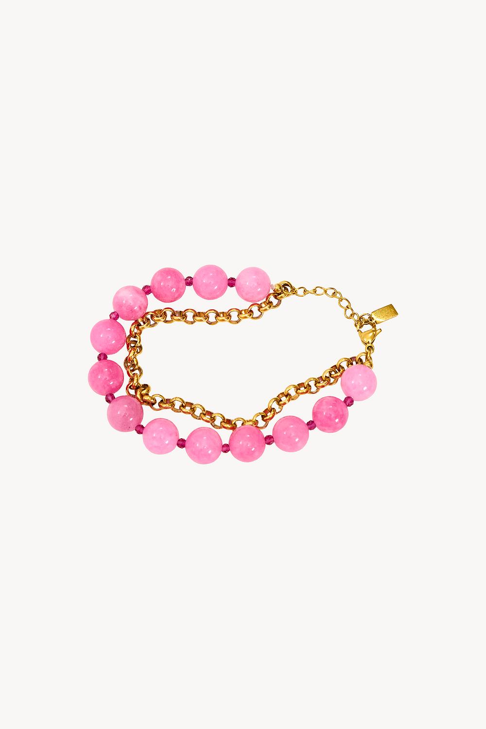 Gold bracelet with pink beads