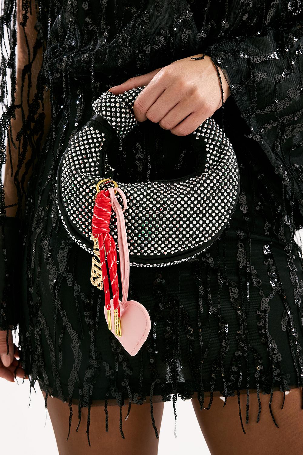 Llavero dorado con corazón rosa