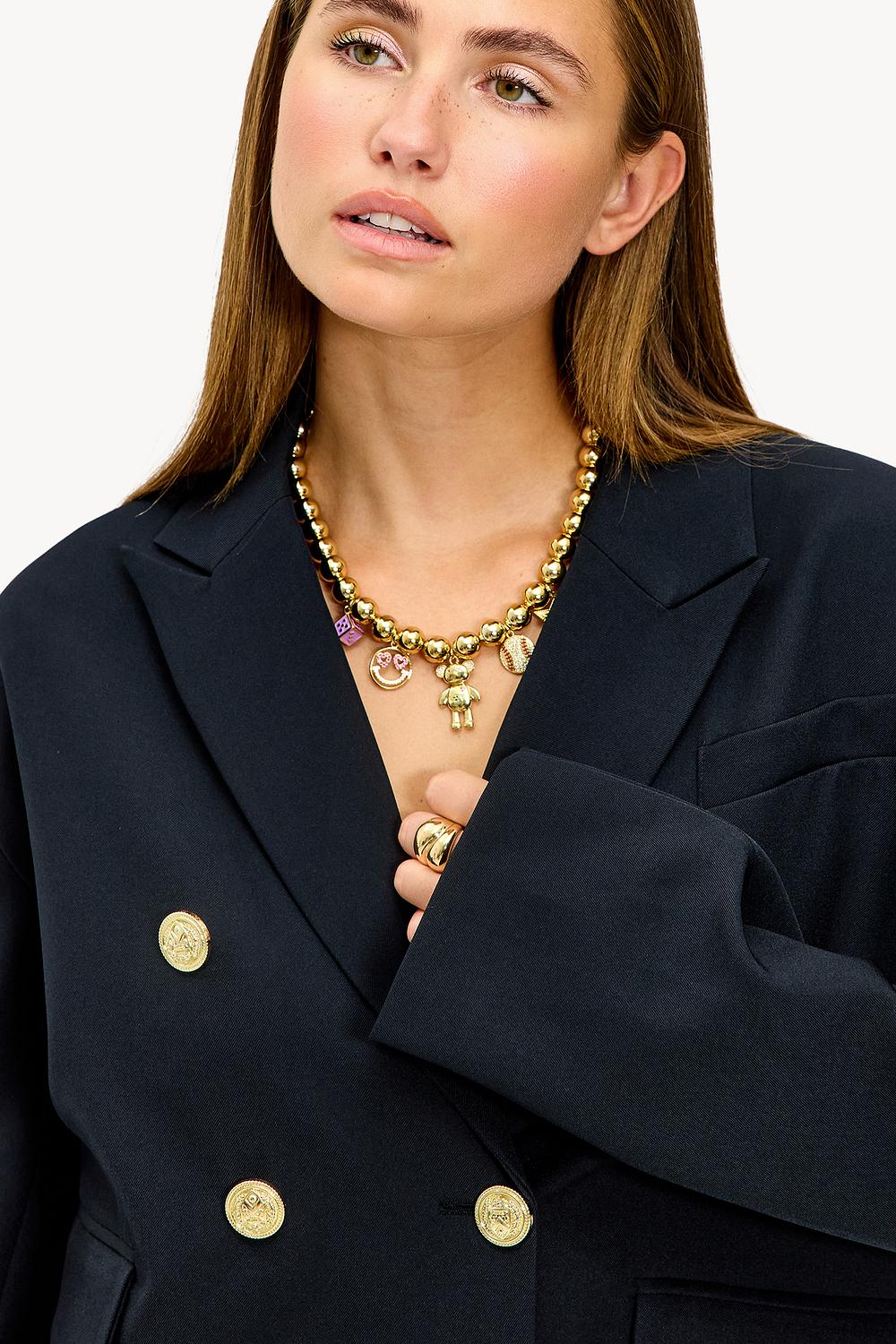 Gold necklace with charms
