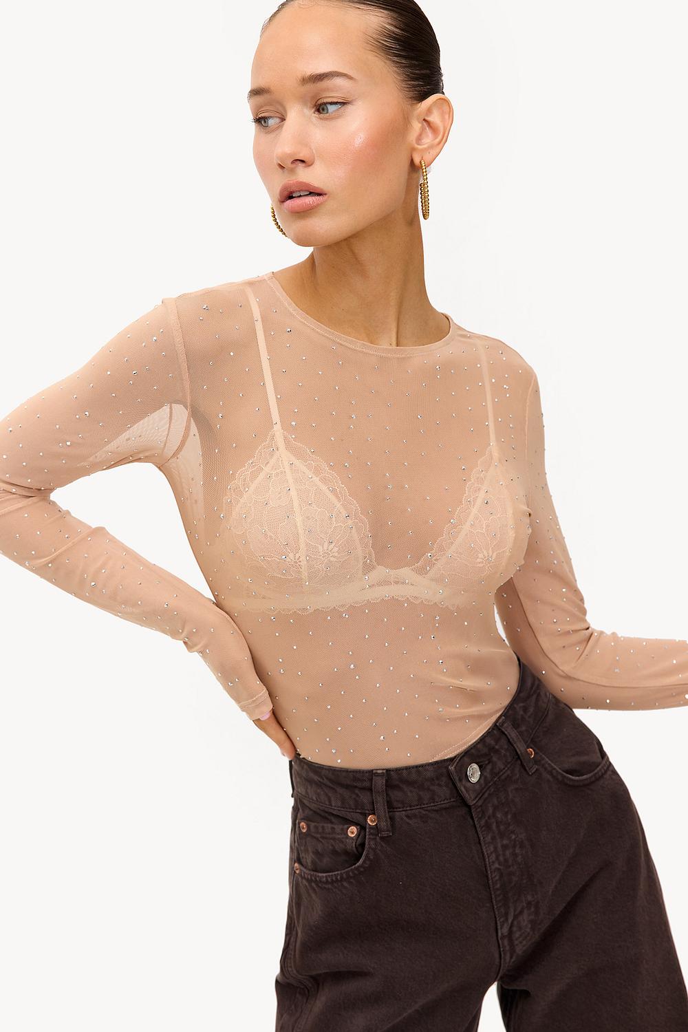 Top beige con purpurina