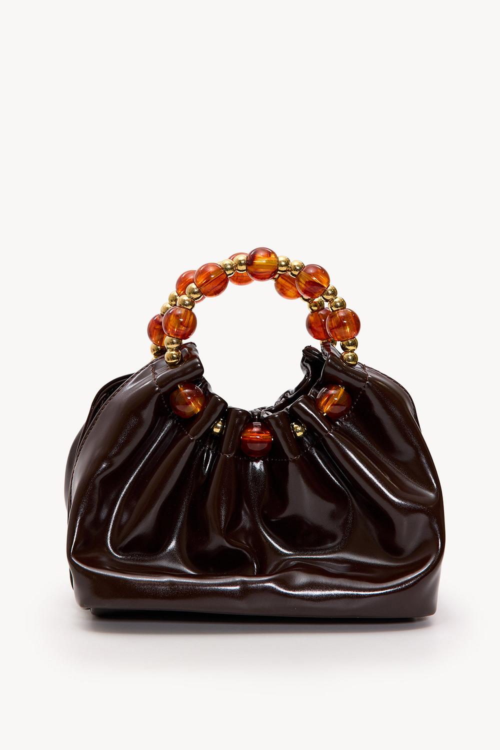 Bruine tas met kralen