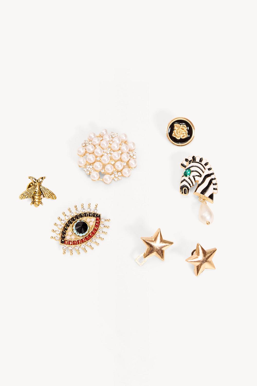 Gold brooches