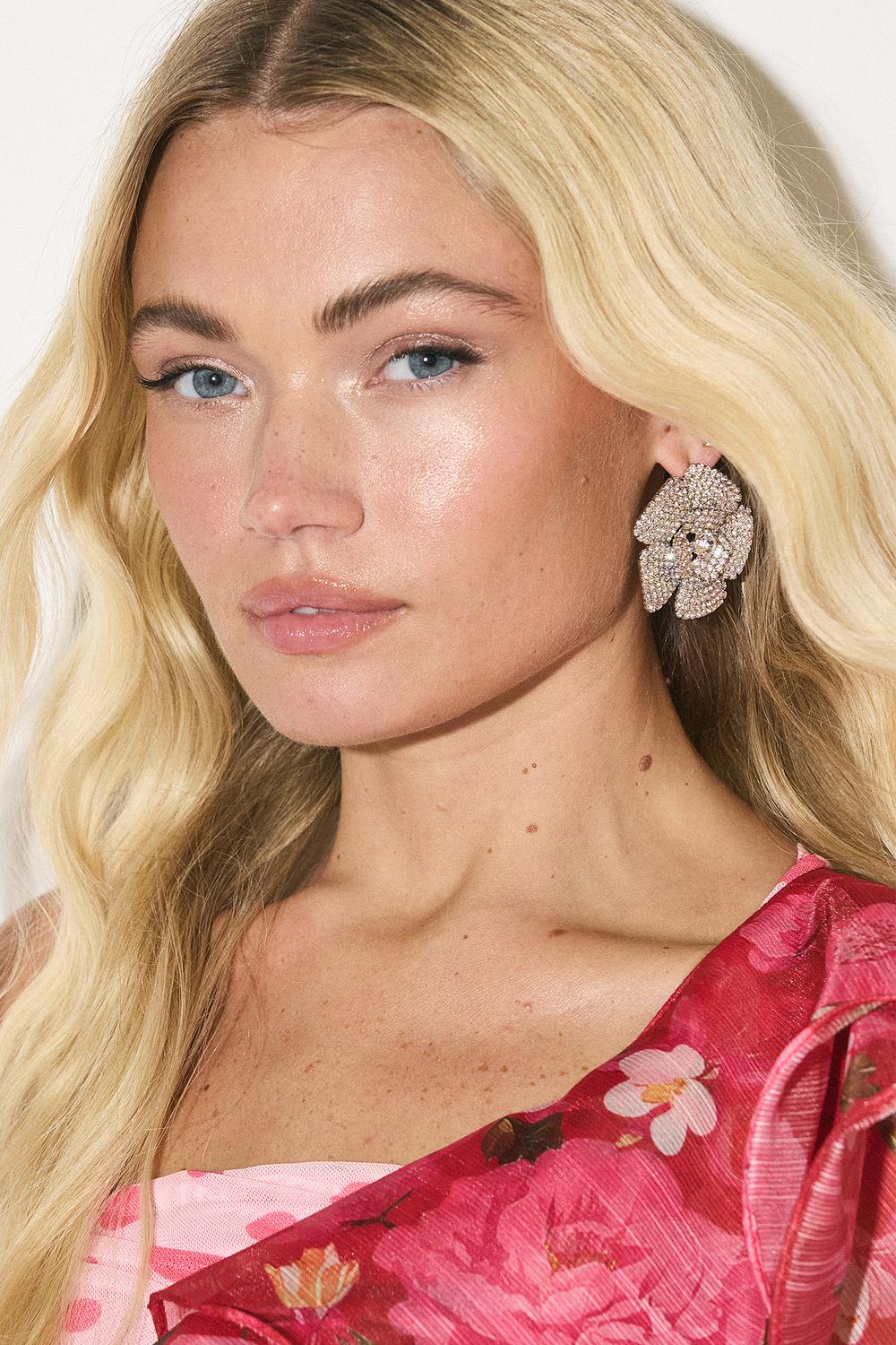 Silver flower earrings with rhinestones