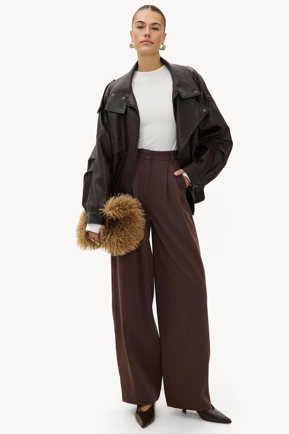 Brown pleated trousers