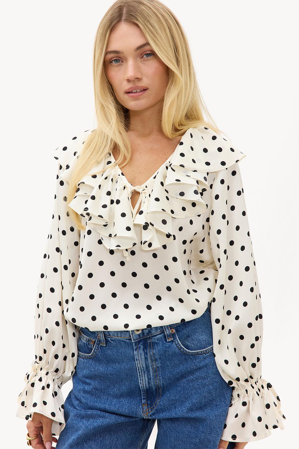 Ecru blouse with black dots and ruffles