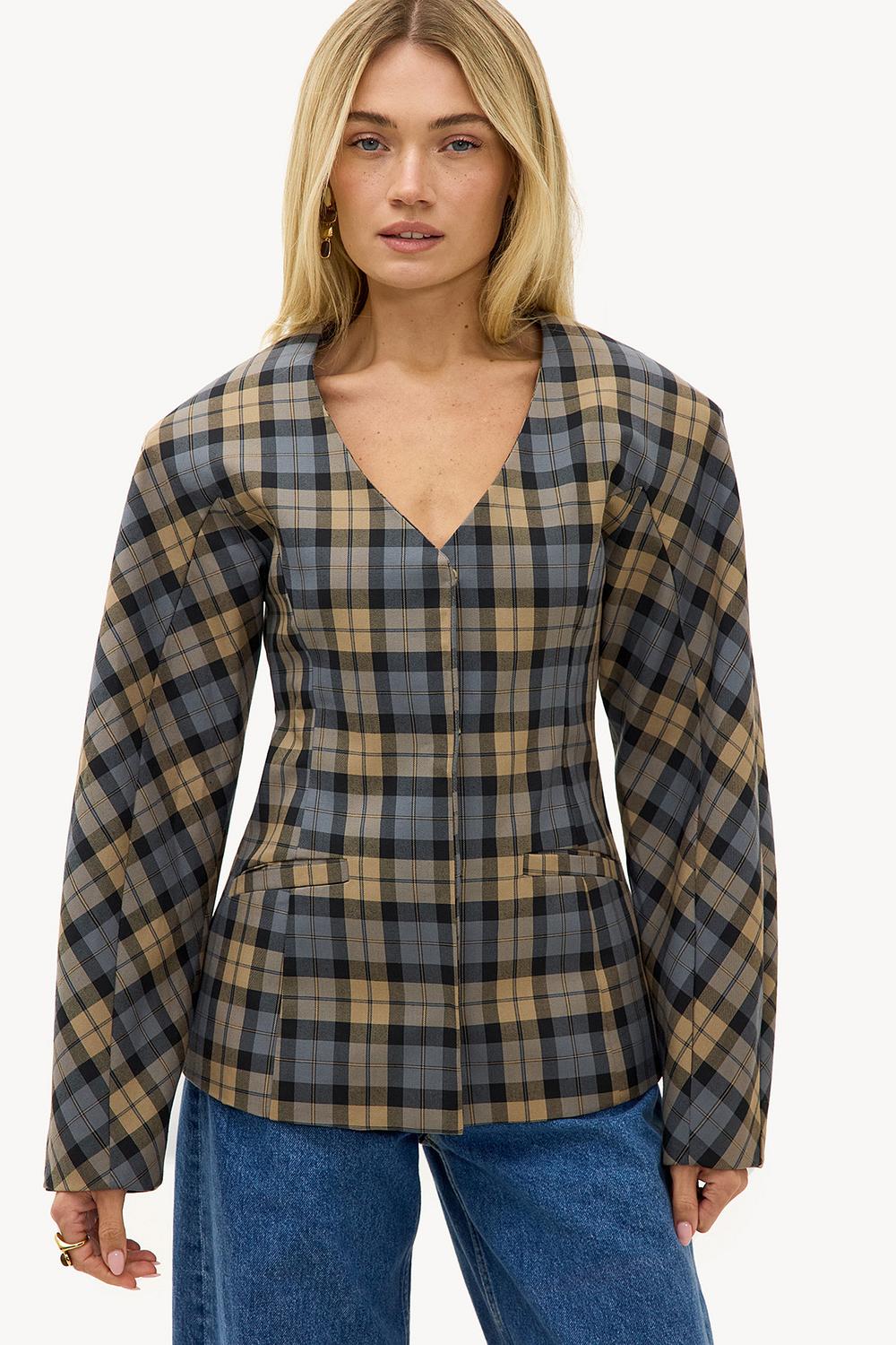 Veste à carreaux bleu clair avec épaulettes