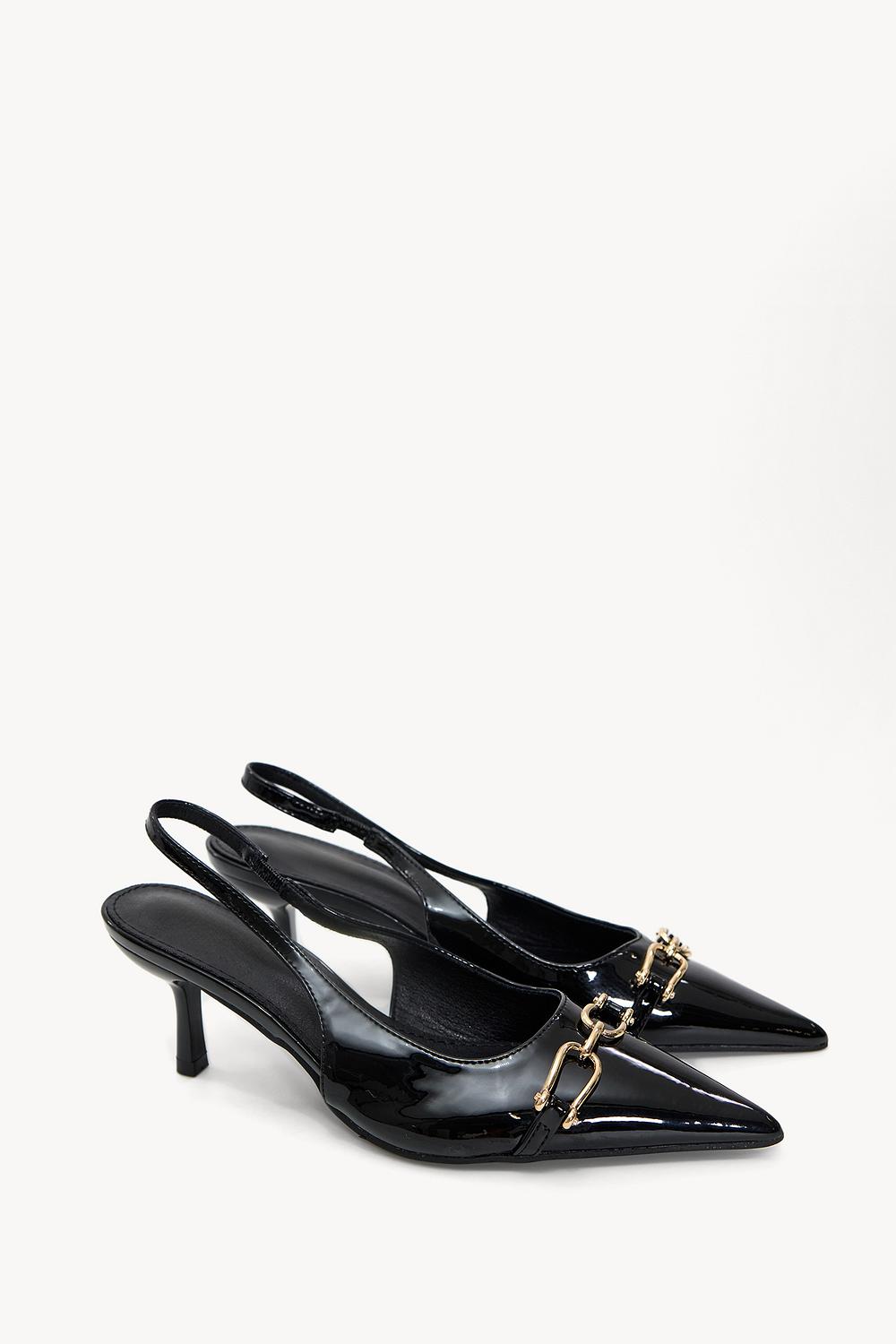 Black heels with gold detail