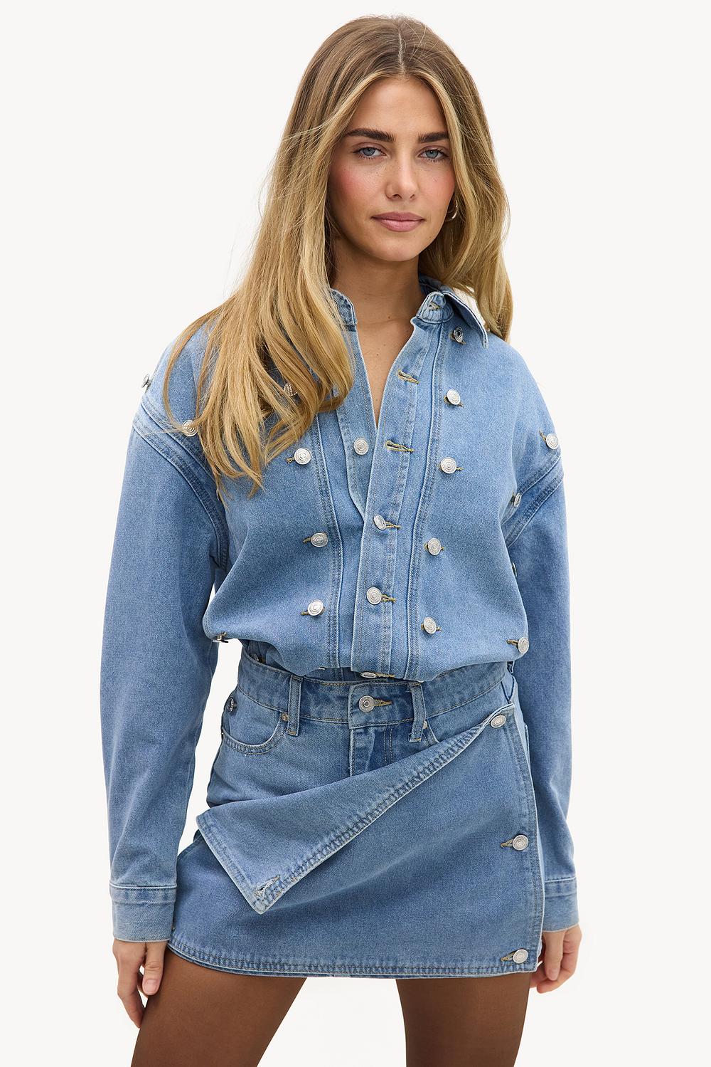 Blue denim blouse with button details