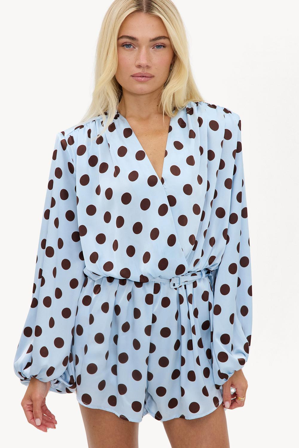 Light blue playsuit with brown polka dots