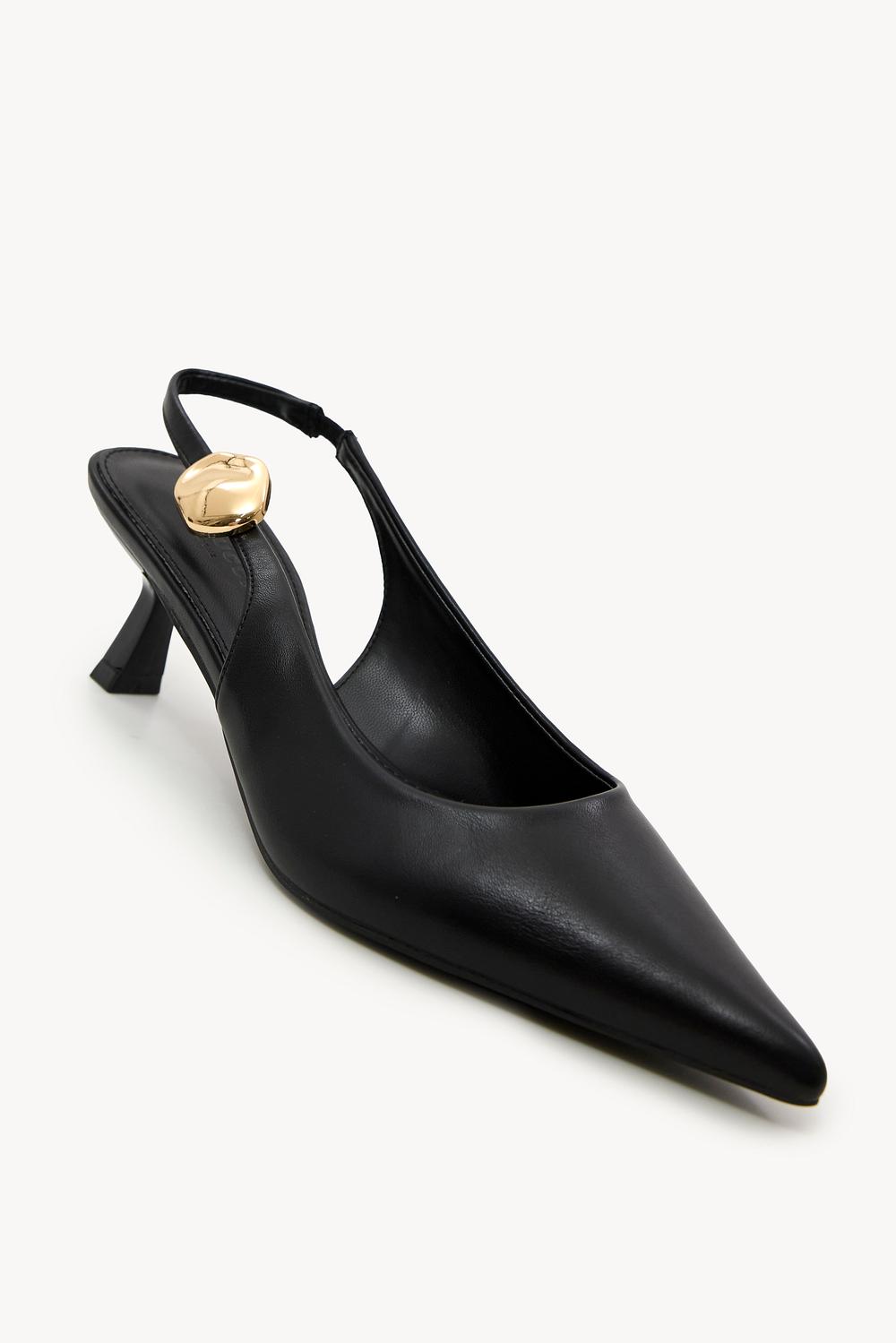 Black heels with gold detailing