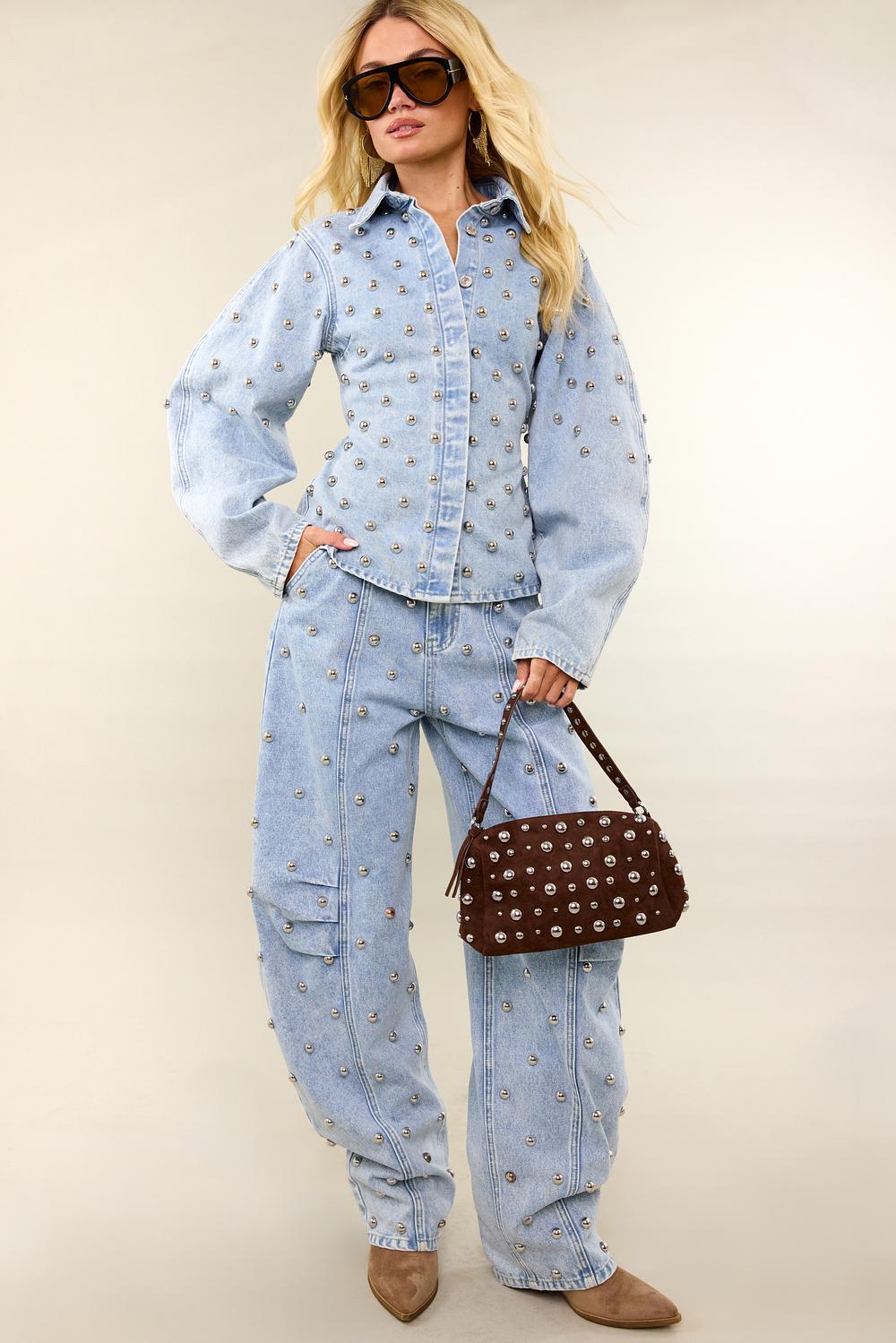 Light blue balloon jeans with studs