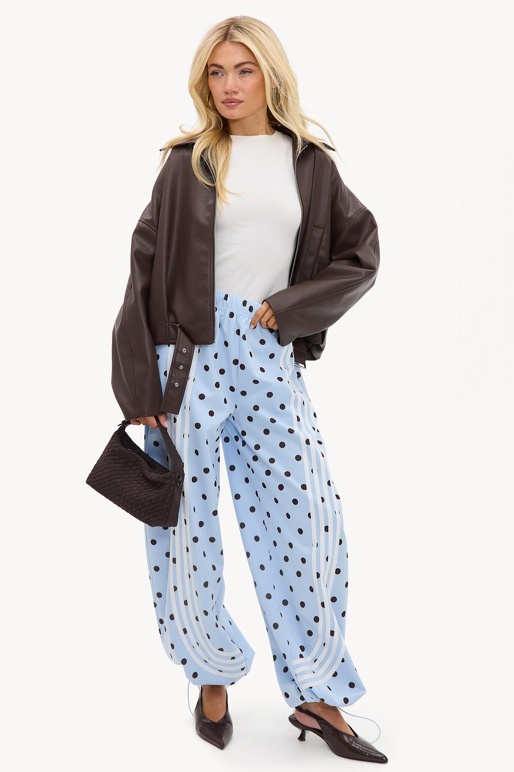 Light blue trousers with polka dots