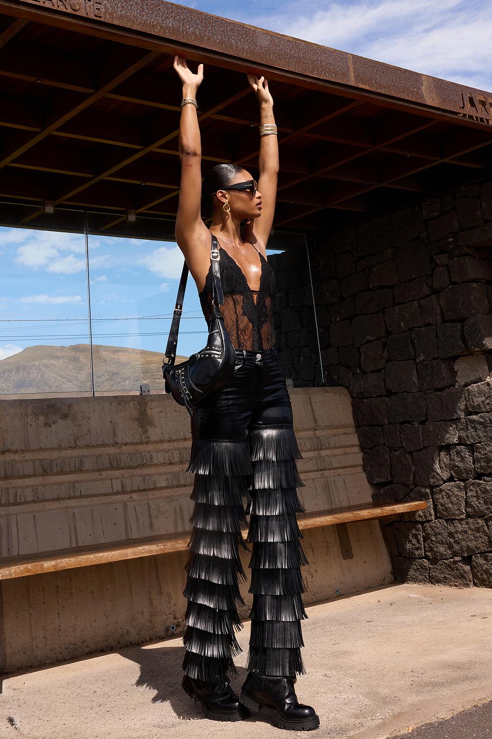 Pantalon PU noir avec franges