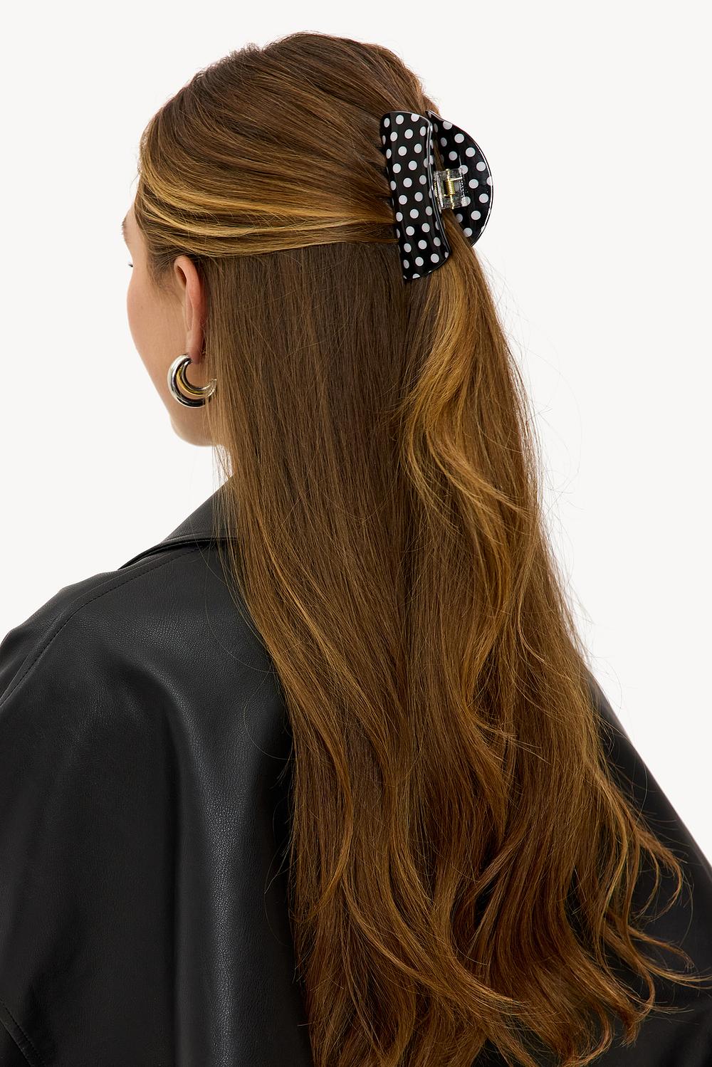 Zwarte haarclip met stippen