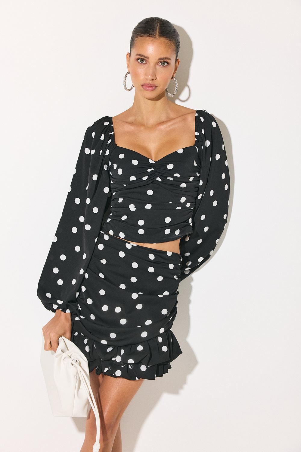 Top noir à pois