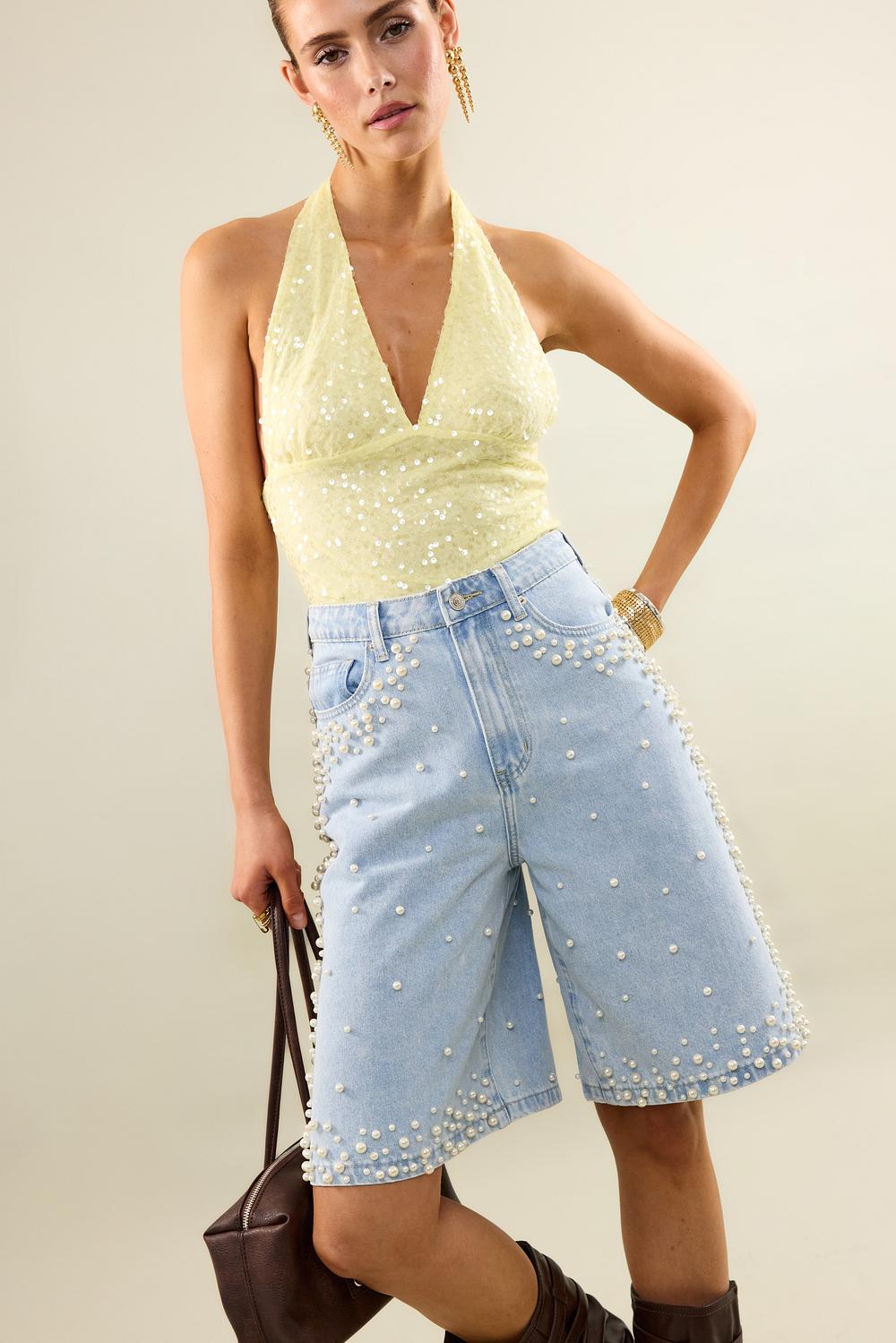 Short azul con perlas