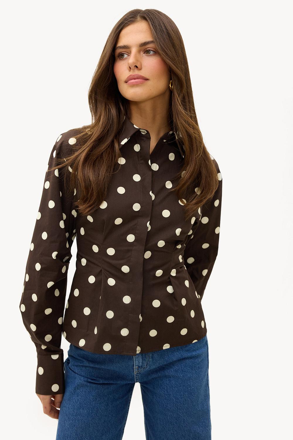 Brown blouse with white dots