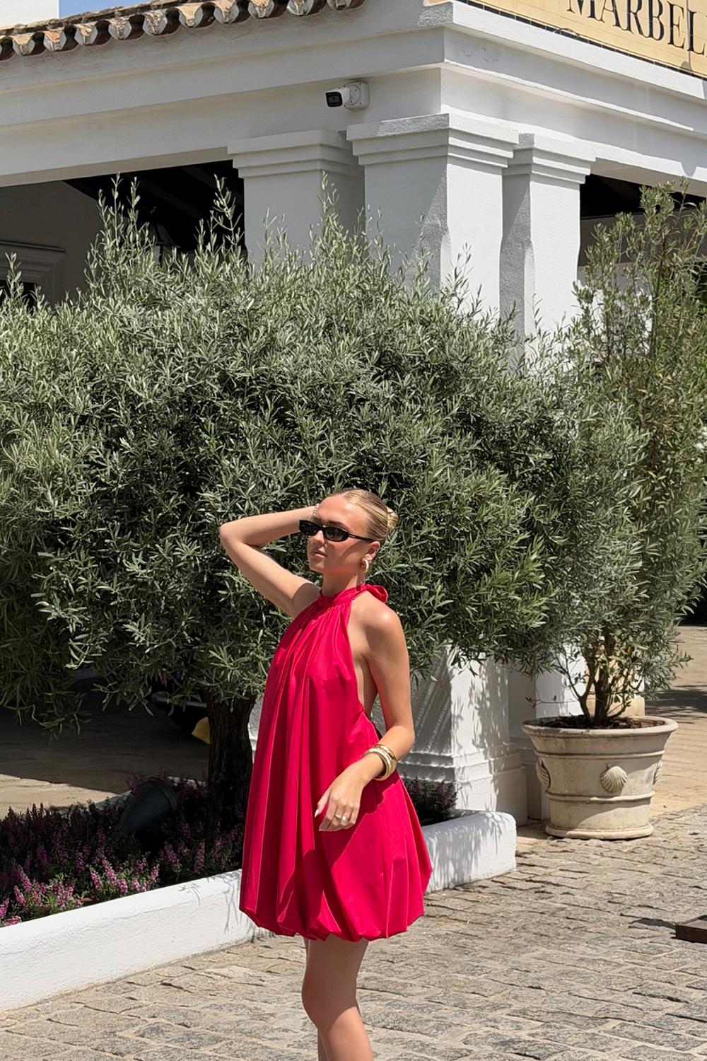 Red halter balloon dress