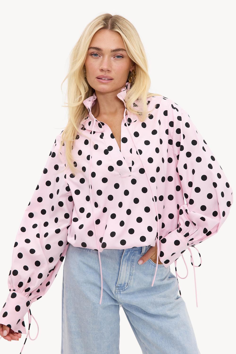 Roze blouse met polkadots