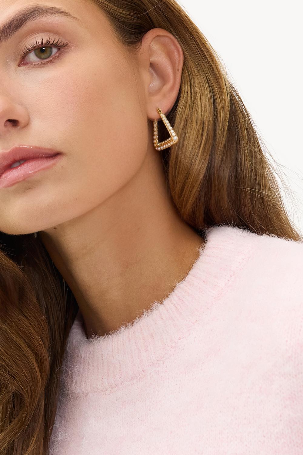 Gouden oorbellen met parels