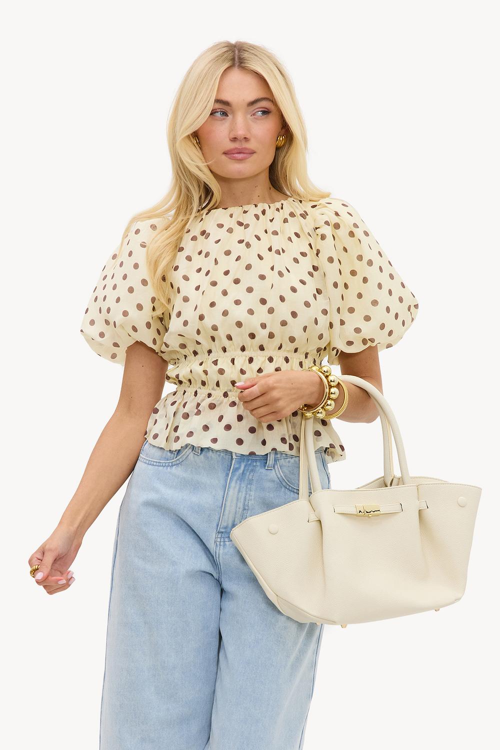 Bolso blanco roto
