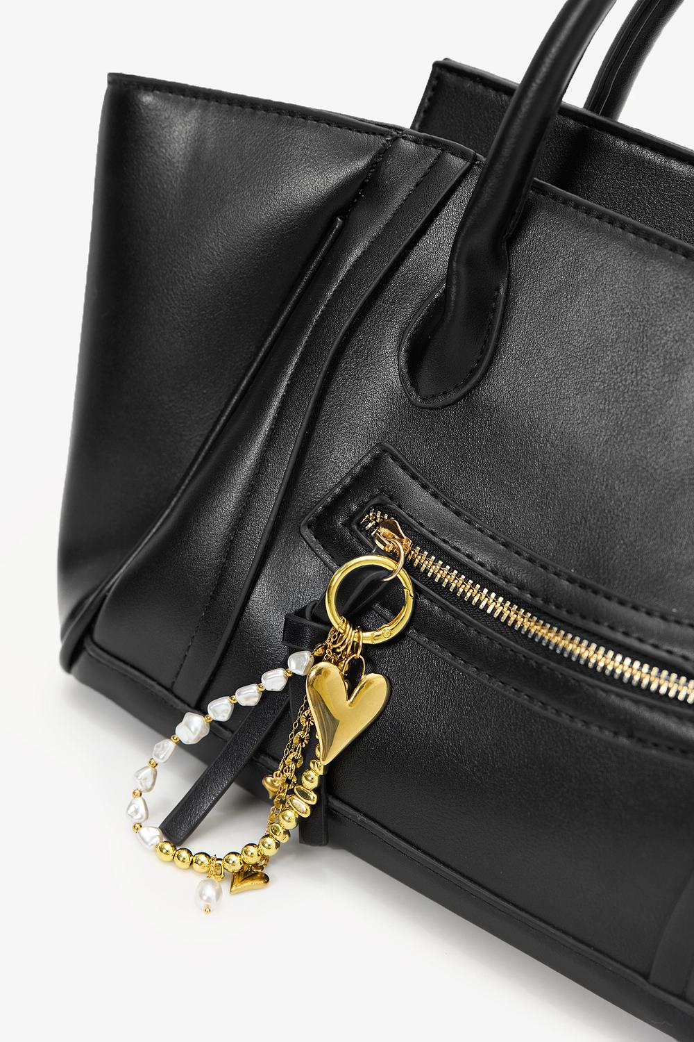 Porte-clés doré avec cœurs