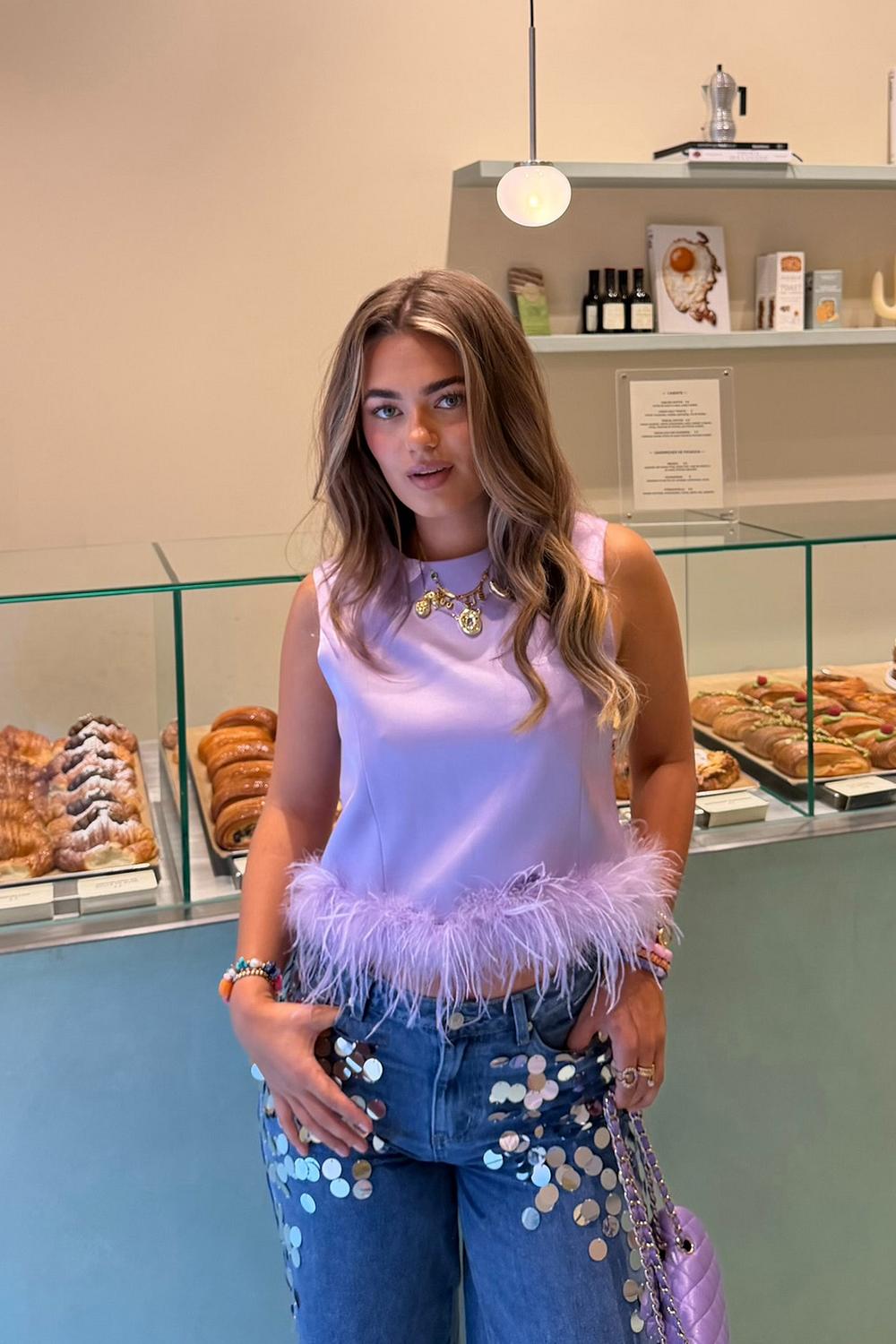Lilac top with feathers