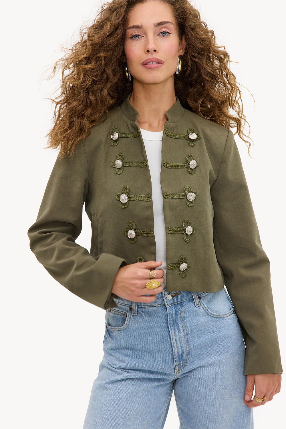 Veste verte avec boutons