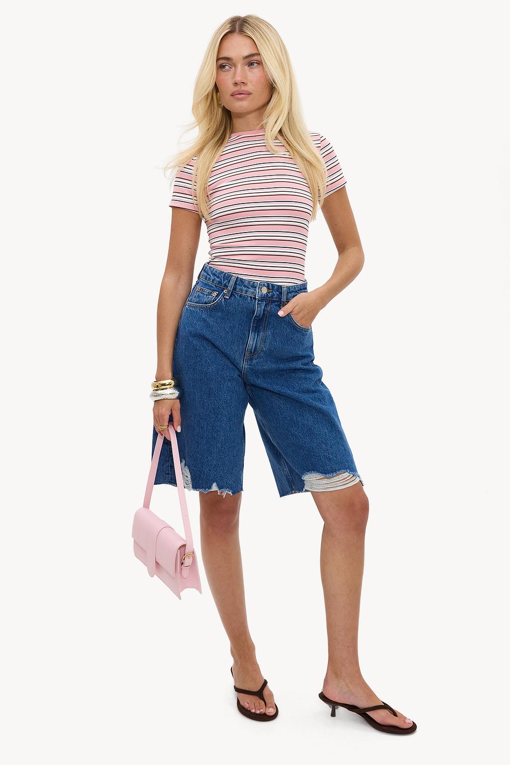 Blue denim jort with ripped details