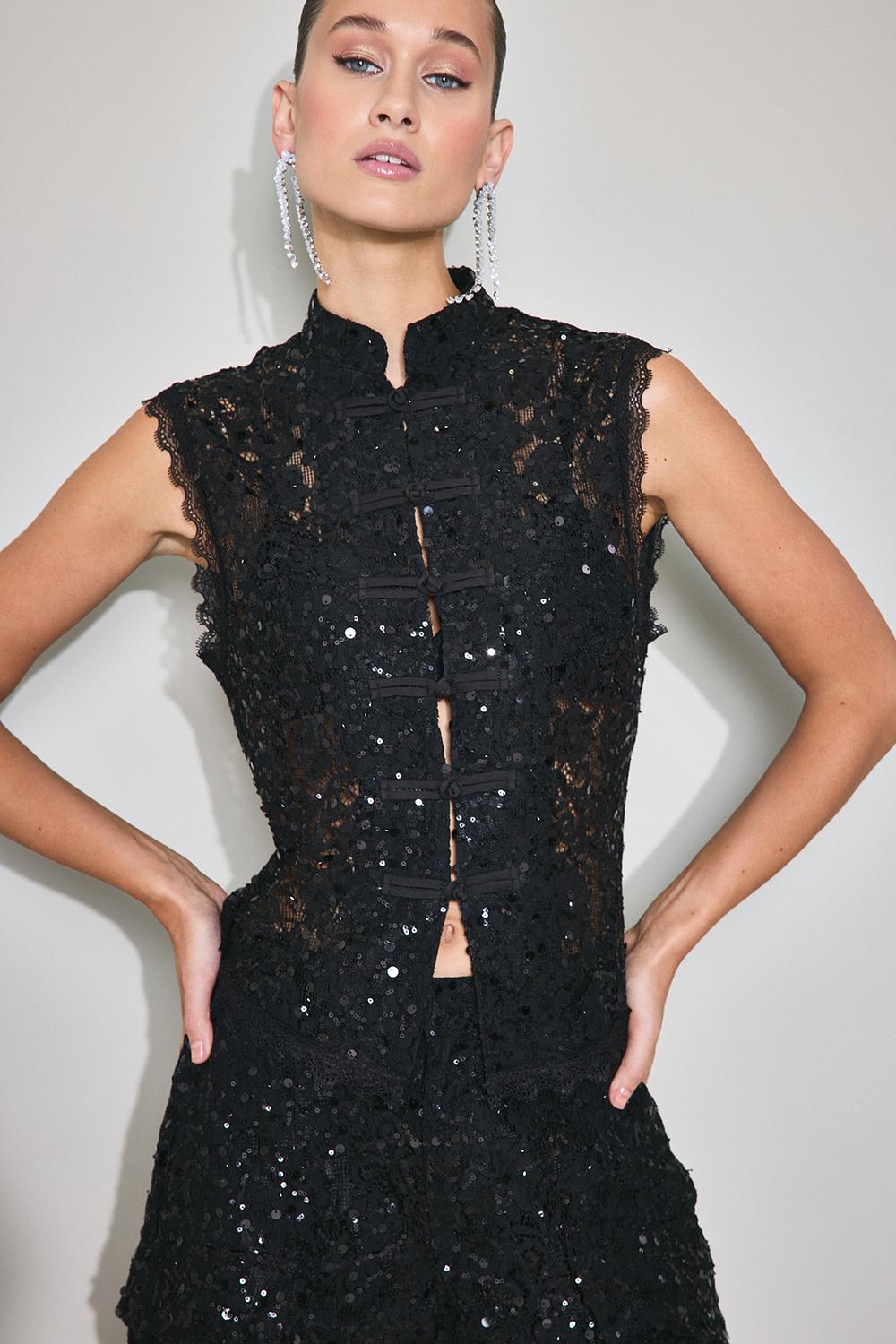 Zwarte gilet met kant en sequins