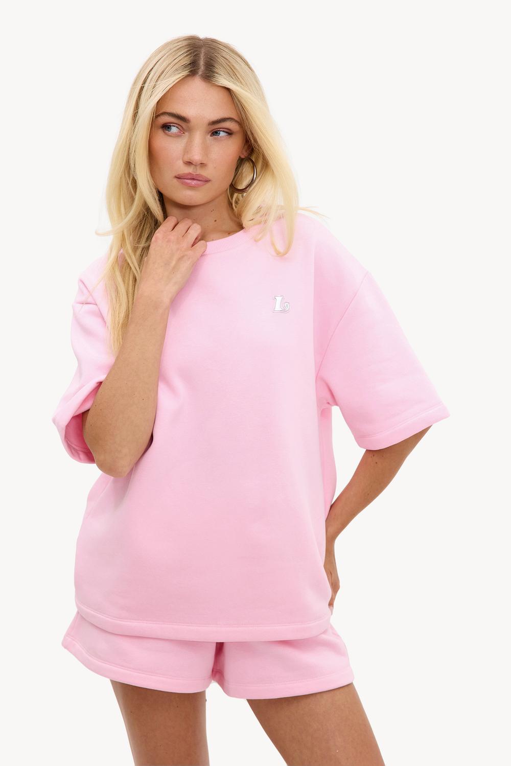Roze t-shirt met zilveren logo