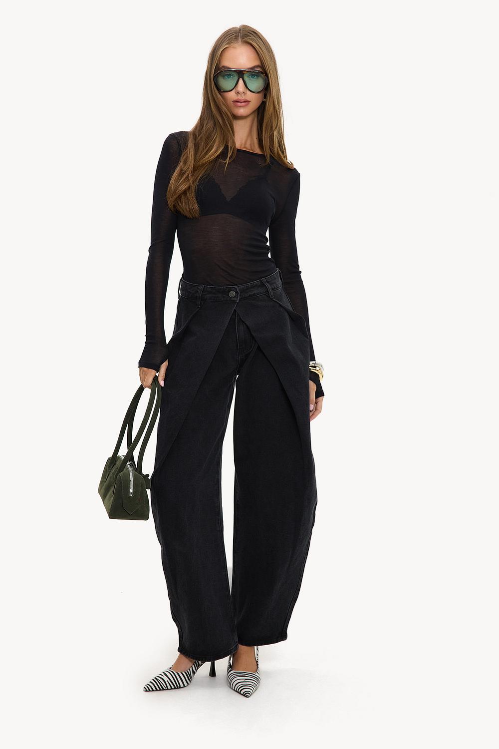 Pantalones negros tipo globo con solapa