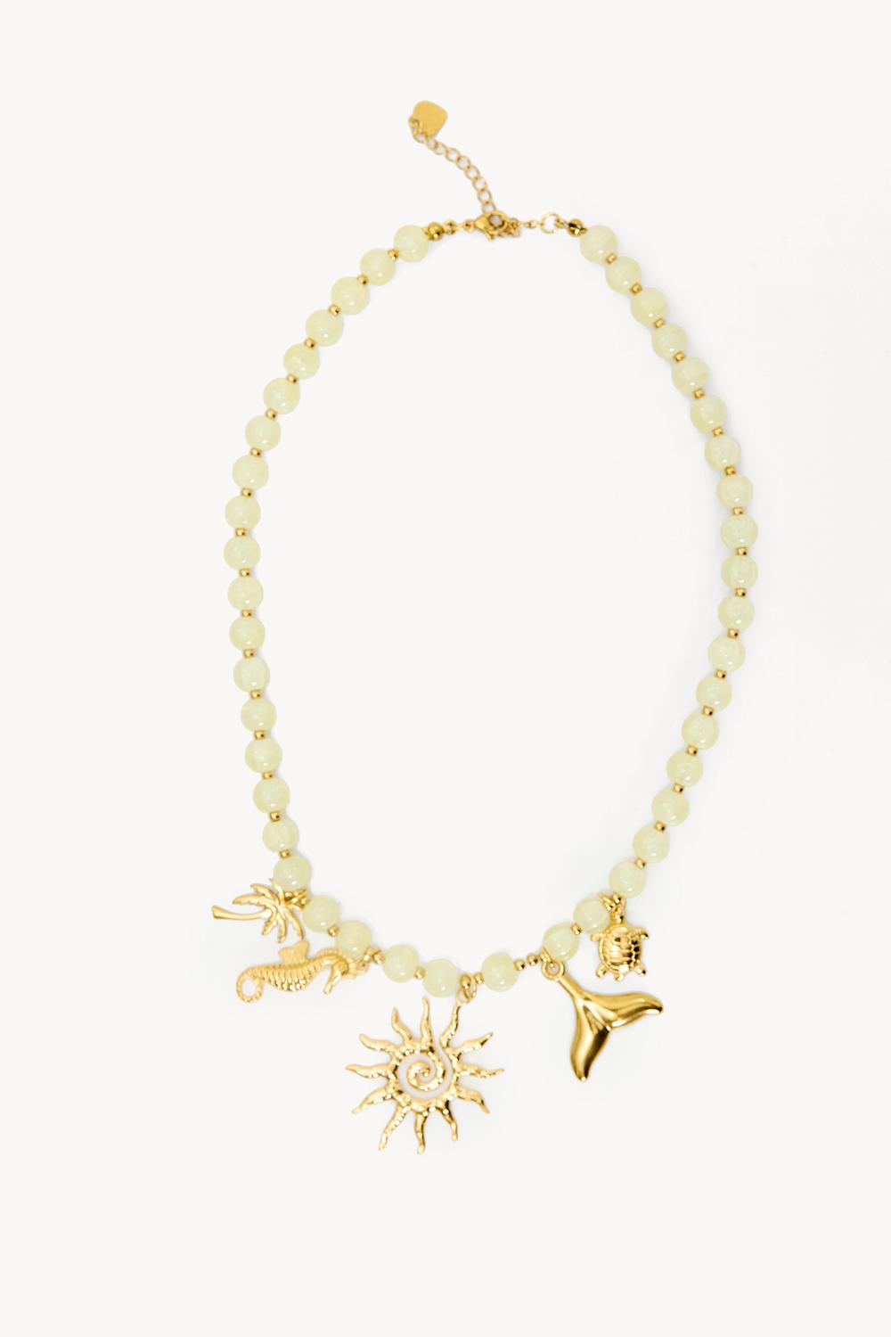 Light yellow beaded necklace with sea charms