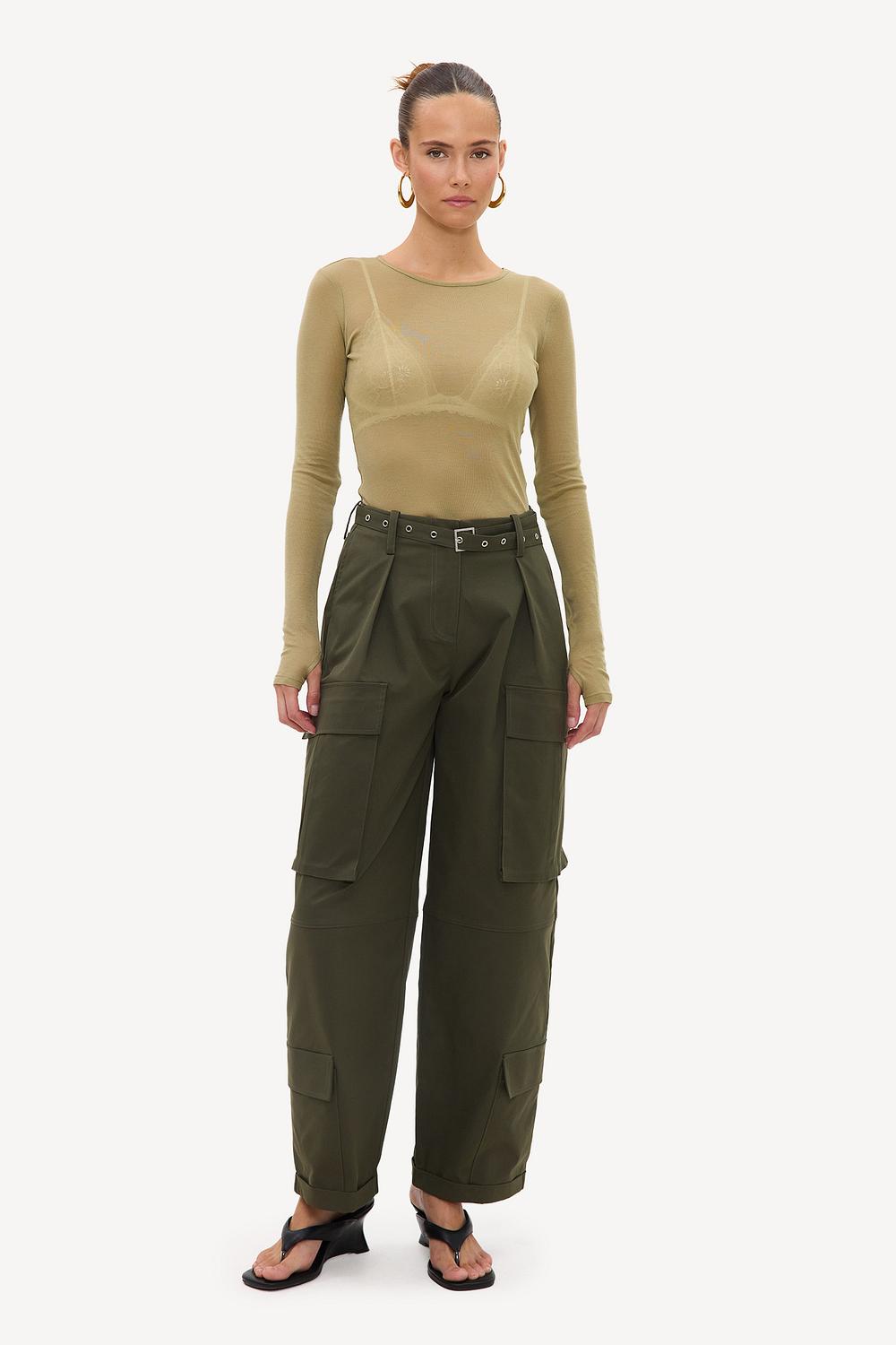 Green cargo balloon pants with a belt