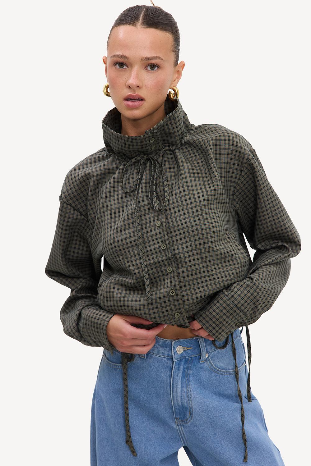 Green blouse with checks