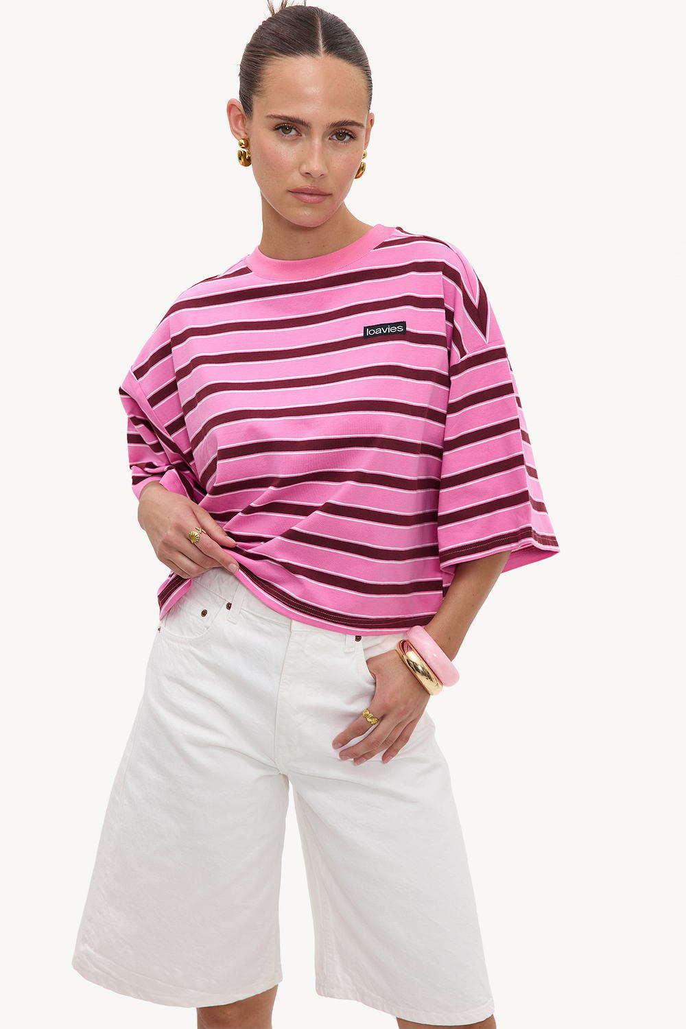 Camiseta rosa de manga corta con rayas