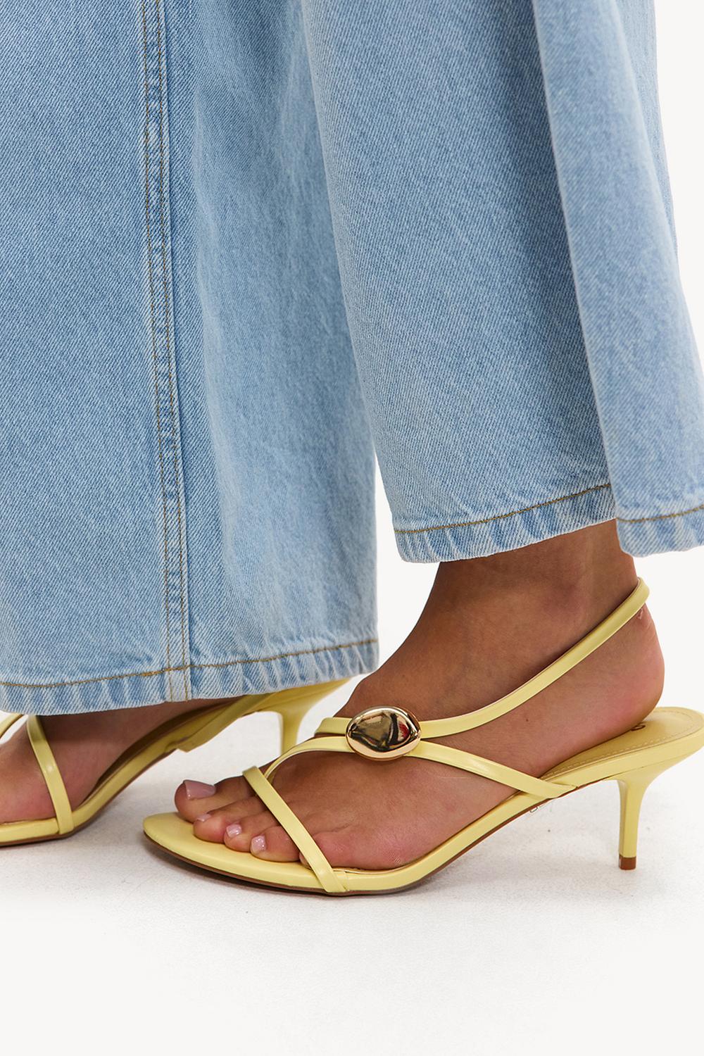Yellow heels with gold detail
