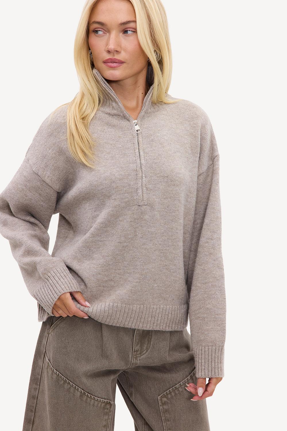 Jersey beige con cremallera
