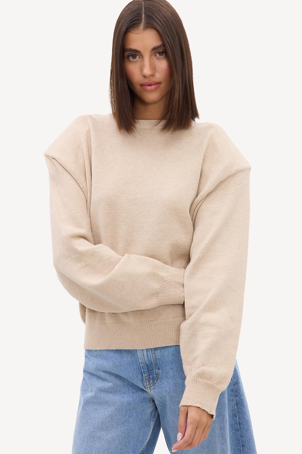 Beige sweater with shoulder pads