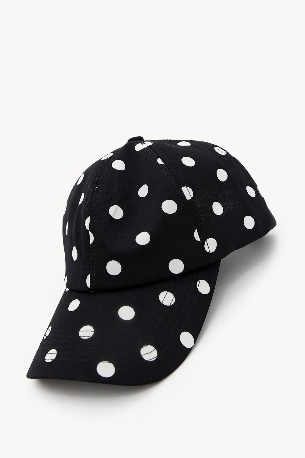 Black cap with white polka dots
