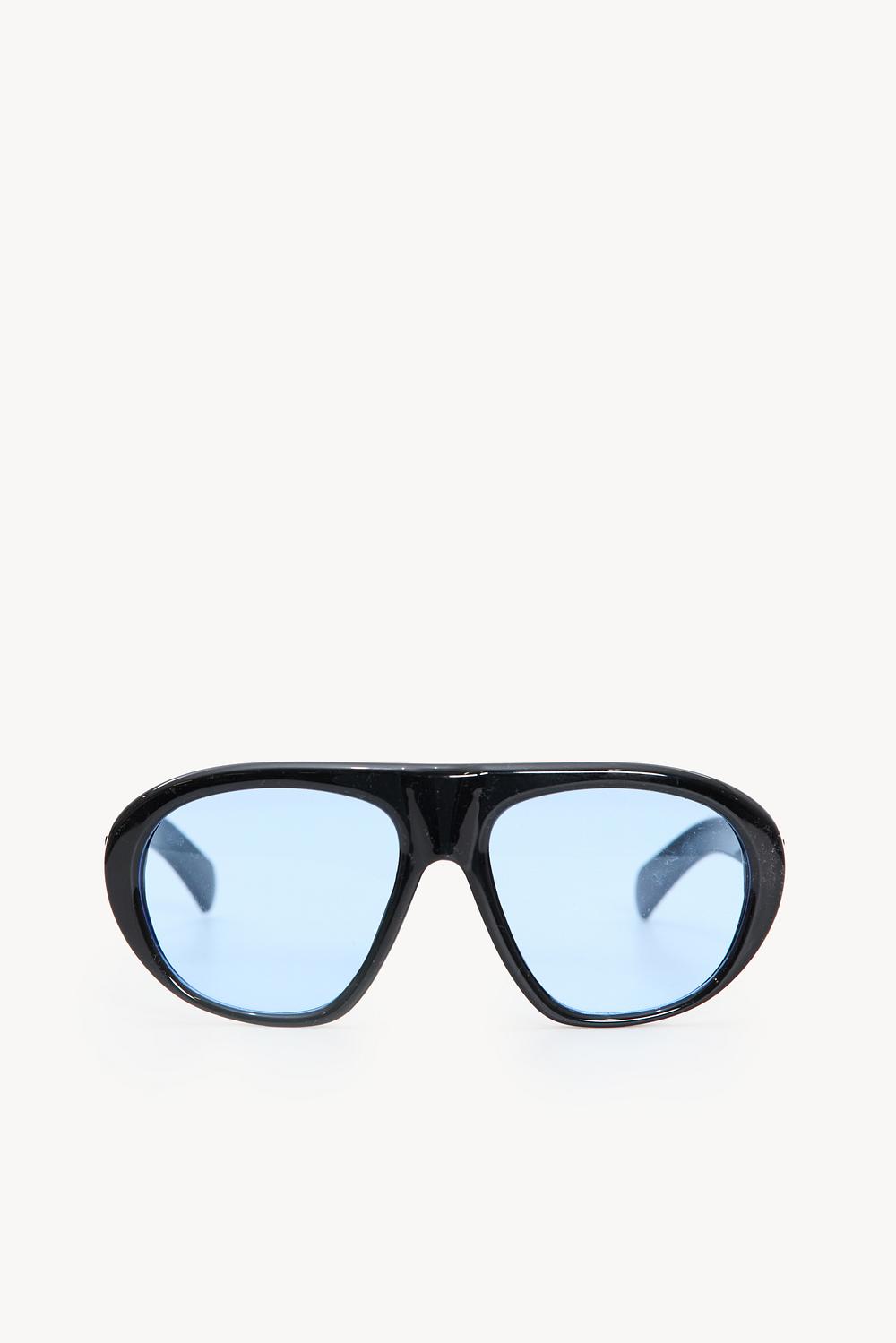 Lunettes de soleil noires à verres bleus