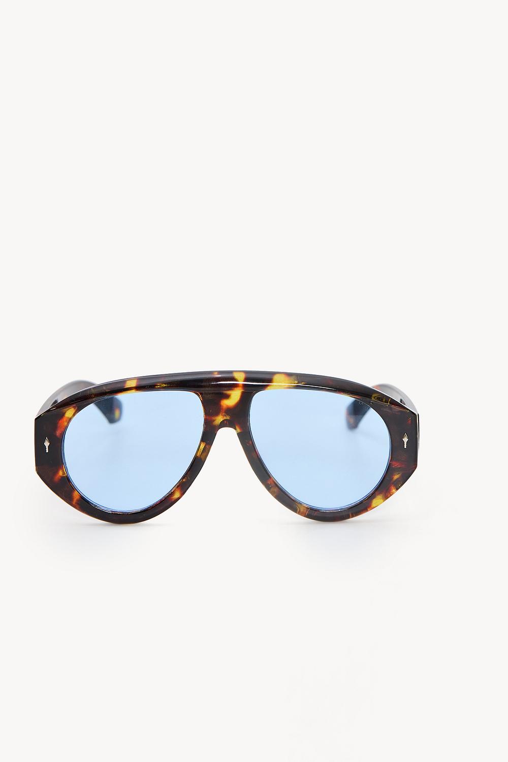 Brown sunglasses with a print and blue lenses