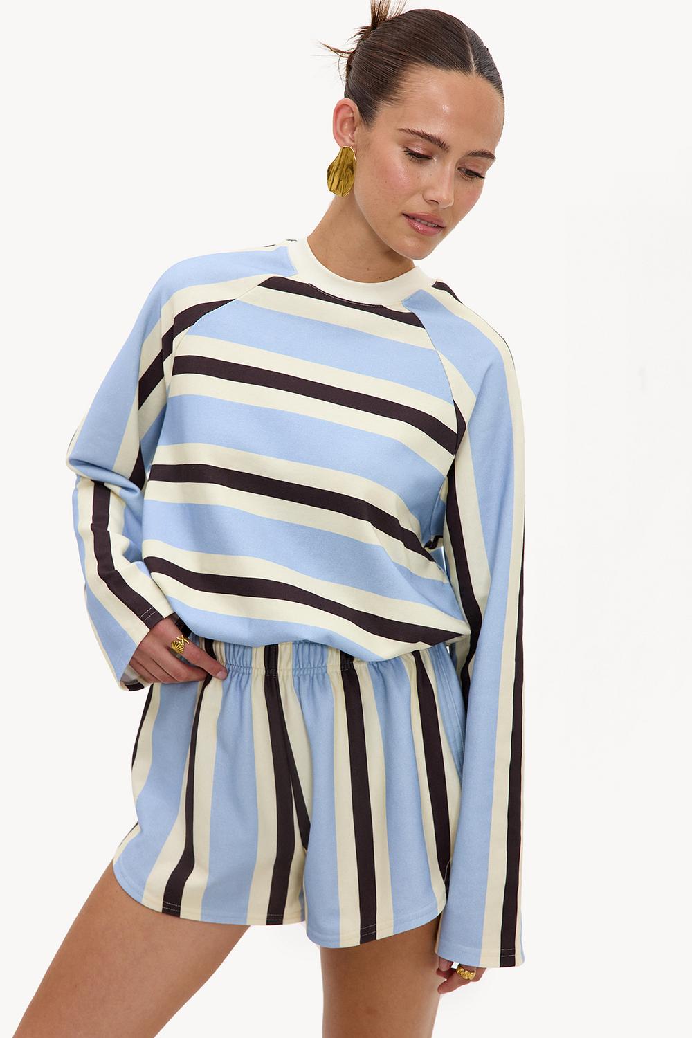 Light blue shorts with brown and off-white stripes