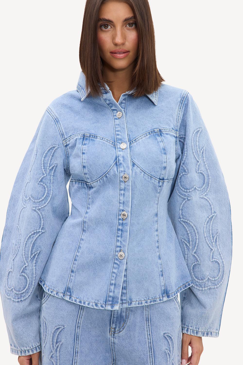 Blue denim jacket with stitching details