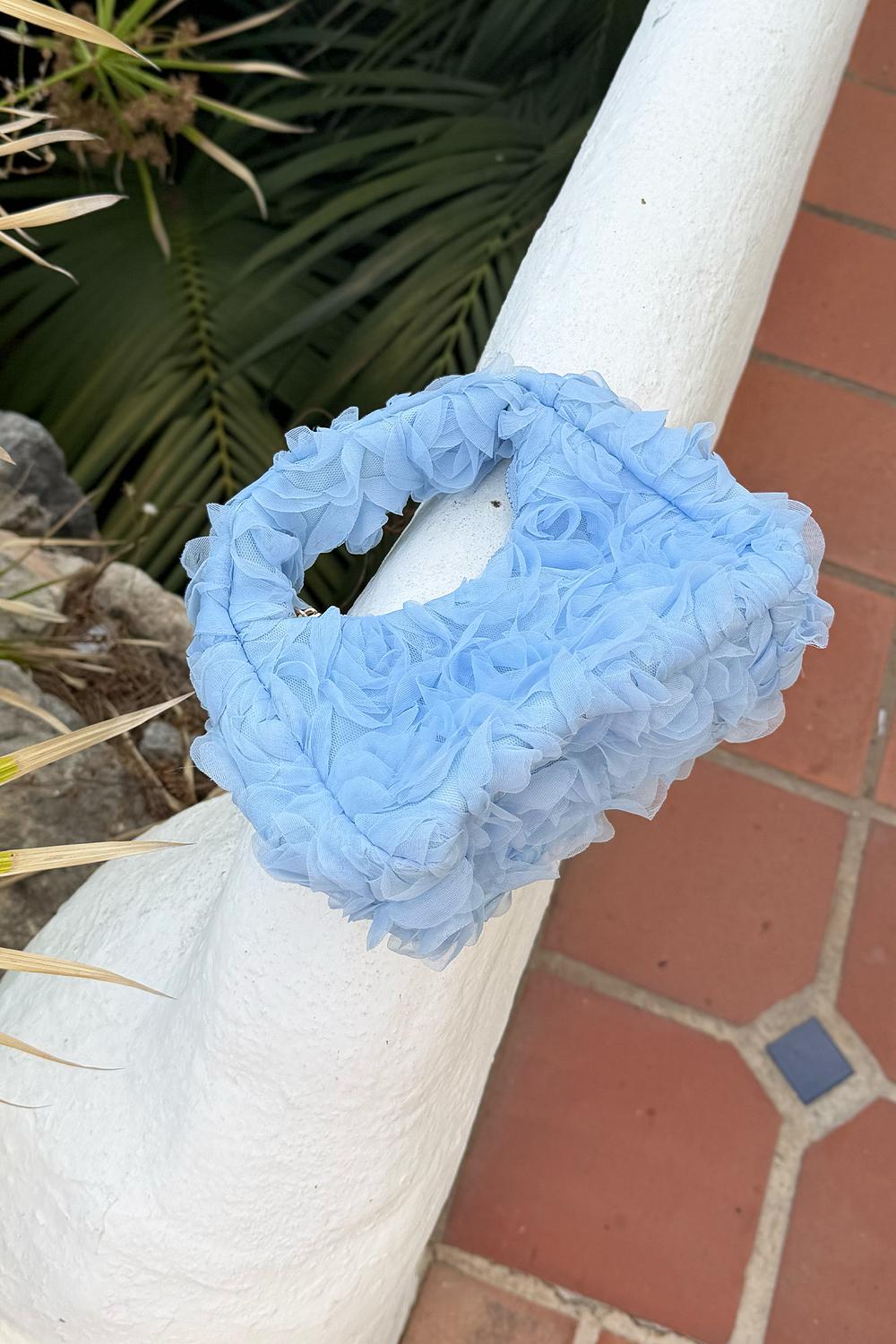 Light blue bag with mesh flowers